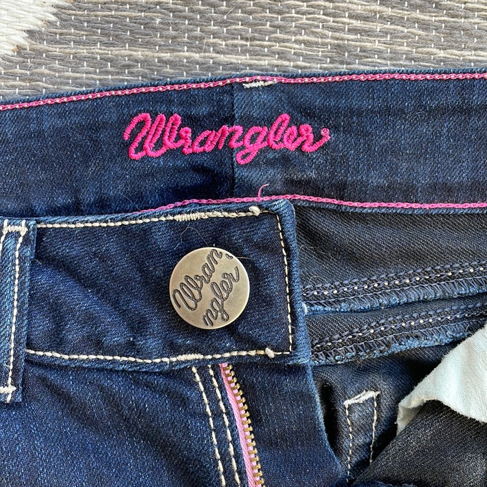 Wrangler Jeans, dark wash, boot leg. Excellent condition.